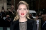 Amber Heard Happily Signing Autographs in Madrid Despite Report She Quits Hollywood
