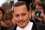 Johnny Depp Moved to Tears After Receiving Standing Ovation at Cannes