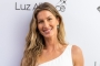 Gisele Bundchen Enjoys Paddleboarding in Bikini With Her Jiu-Jitsu Instructor