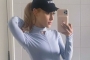 Ariana Grande Mocks Her Cat Eyes and Overdrawn Lips as She Reflects on Her Old Makeup