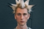 Machine Gun Kelly Makes Fan's 'Dreams Come True' by Punching Him in the Face