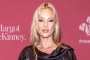 Kate Moss Looks Unrecognizable on Cigarette Break During Family Outing