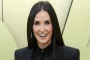 Demi Moore Suffers Wardrobe Mishap in Daring Outfit at Paris Fashion Week