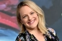 Elisabeth Moss Appears in Pain as She Caresses Her Stomach in Rare Sighting