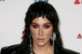 Kesha Steps Out in Los Angeles to Announce 'New Music Coming Soon' With Cardboard Sign