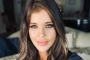 Donna D'Errico Reshares Racy Photo After Blasting Haters Over Her Removed Pics 