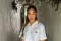 Jordyn Woods Stuns in Coral-Colored Sizzling Outfit During Tropical Getaway