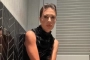 Lisa Rinna Shows Off Chest in Wet Top in New Magazine Photos