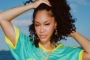Saweetie Praised After Uncharacteristically Covering Up in Hijab in New Photos