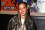 Tinashe Paddleboarding in Sizzling Outfit During Tropical Getaway