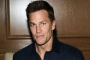 Tom Brady Looks Downcast While Taking His Dogs Out Amid Claim He's 'Lonely'