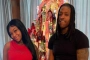 Summer Walker Cuddles New Boyfriend Rico Recklezz in Front of Christmas Tree