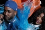 SZA Dumps Bucket of Water on Kendrick Lamar in Trailer for 2025 Super Bowl Halftime Show