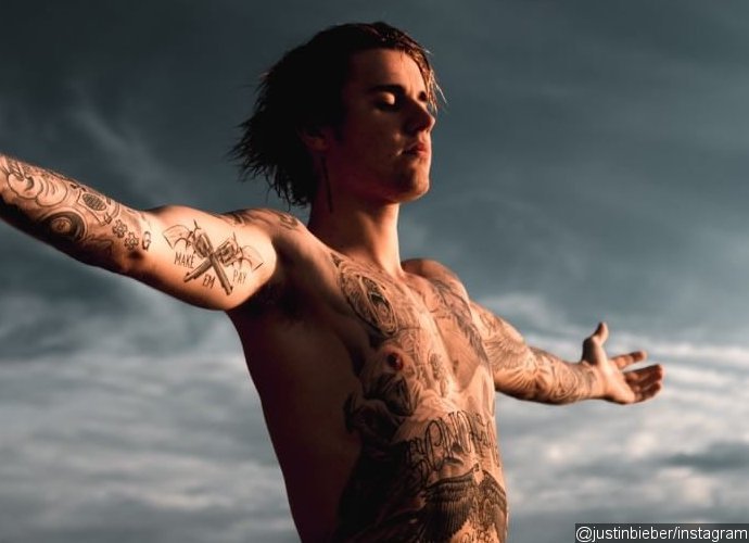 Justin Bieber Flaunts His '100 Hours of Work' Tattoo 