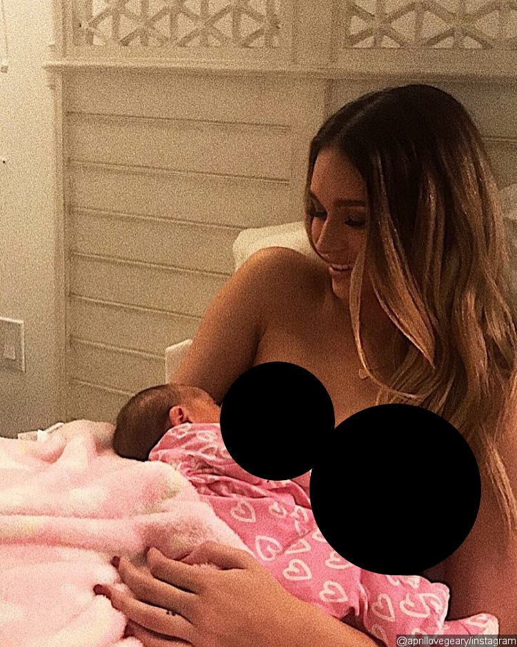 April Love Geary breastfeeding her and Robin Thicke's daughter