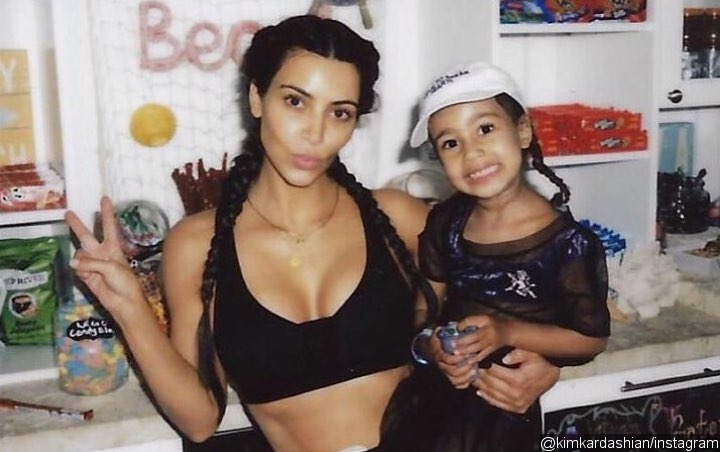 Kim Kardashian Criticized For Straightening North West S Curly Hair