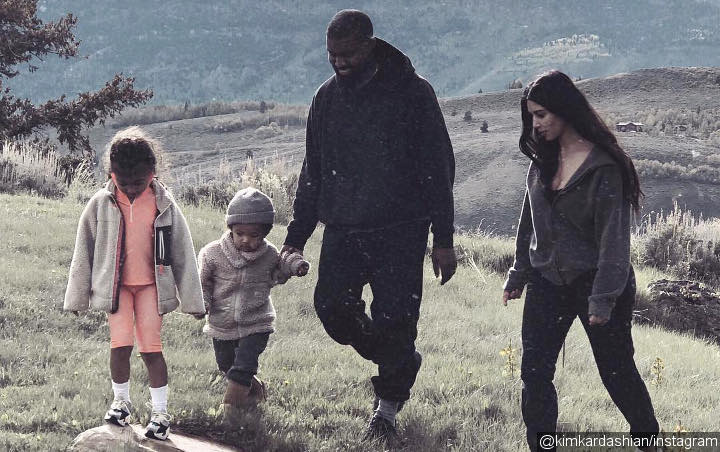 Kanye West Graces Harper's Bazaar's Cover With North and Saint