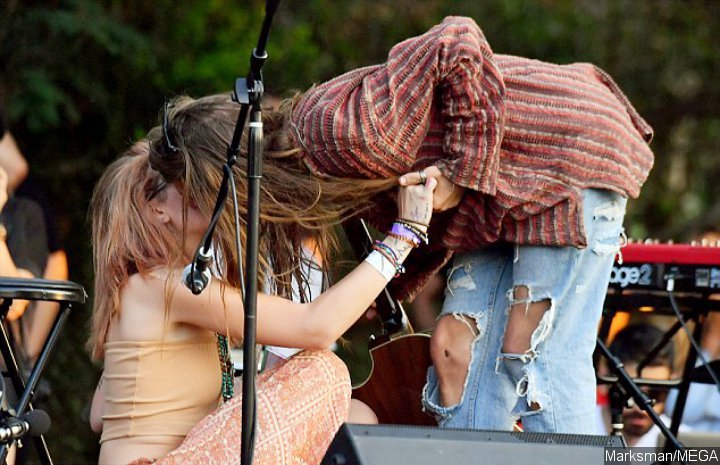 Gabriel Glenn and Paris Jackson put up loved-up display during show.