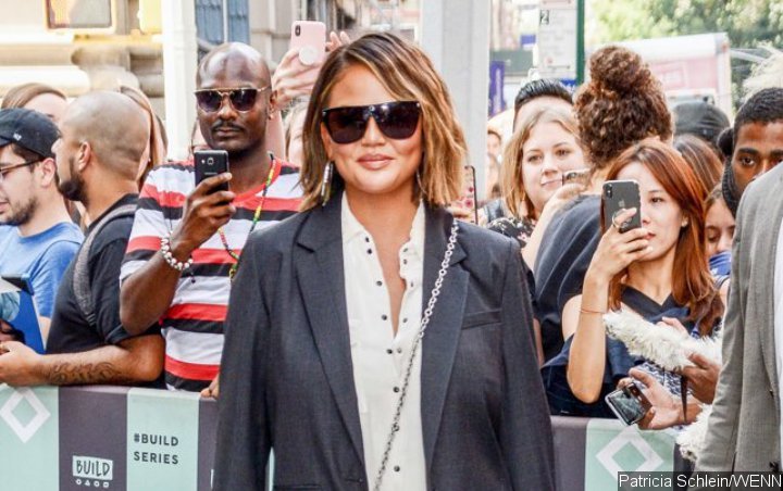 Chrissy Teigen Tries To Make Troll Happy After Getting Shamed