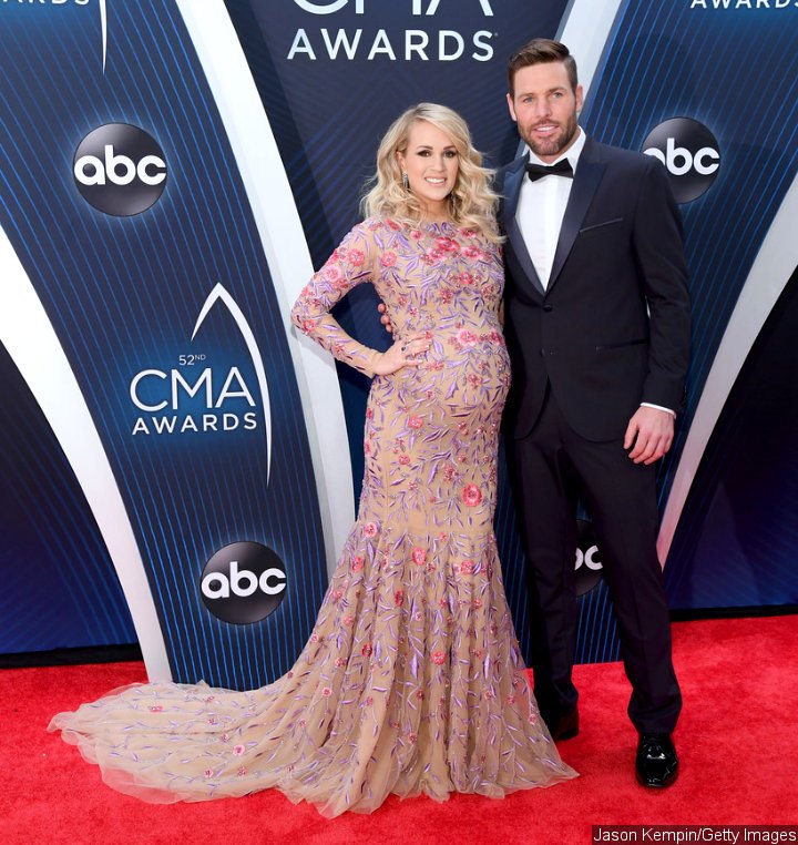 Carrie Underwood and Mike Fisher at 2018 CMA Awards