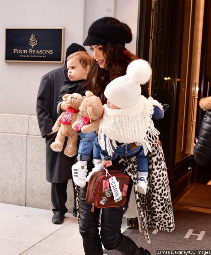 HandsOn Mom Amal Clooney Holds Her Twins by Herself in NYC