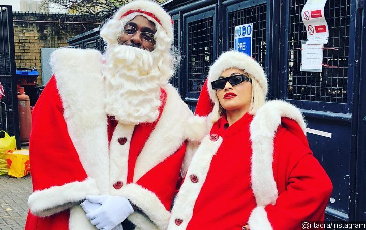 Rita Ora and Idris Elba Channel Santa Claus When Visiting Sick Children