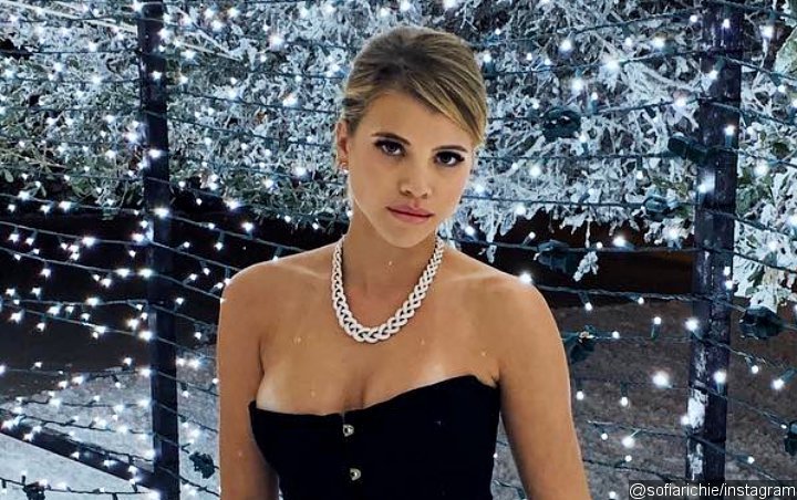 Sofia Richie's Breasts Almost Spill Out of Her Very-Plunging Dress at Kris Jenner's Christmas Party