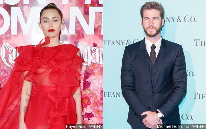 Miley Cyrus Stands In for 'Recovering' Liam Hemsworth at 'Isn't It Romantic' Premiere