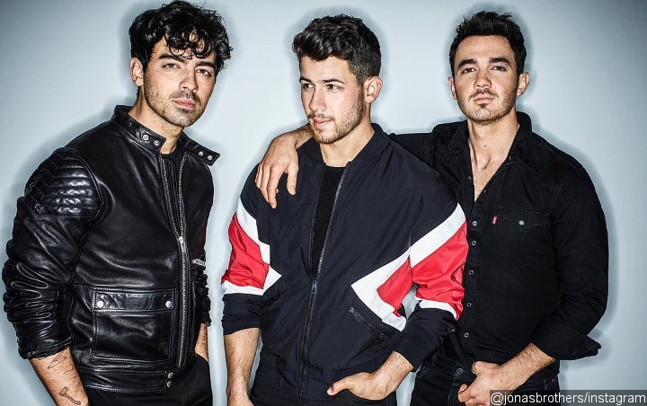 Watch: Jonas Brothers Take a Sip of Bird Saliva to Avoid Answering Awkward Question