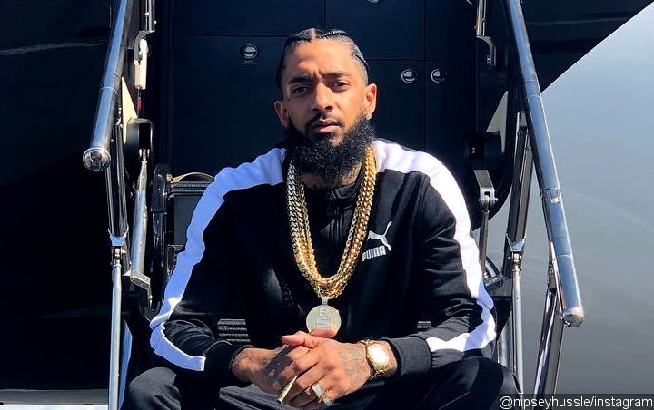 People Enraged After Teenage Girl Vandalizes Nipsey Hussle's Mural