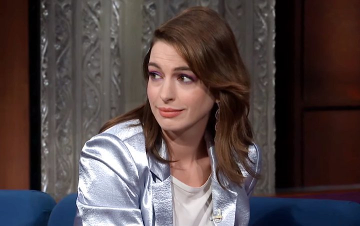 Watch Anne Hathaway Recounts Striking Awkward Pose To Hide