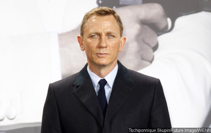 Injured Daniel Craig Spotted on Crutches at New York Airport