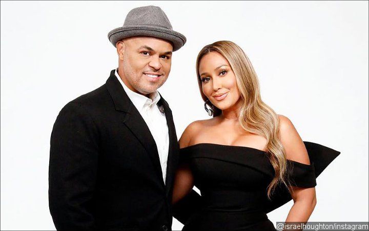 Read Adrienne Bailon's Husband's Savage Clapback to Troll Criticizing Them for Not Having a Child 