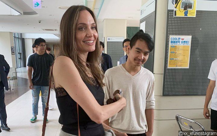 Video: Angelina Jolie 'Trying Not to Cry' as She Drops Son Maddox Off at South Korean College