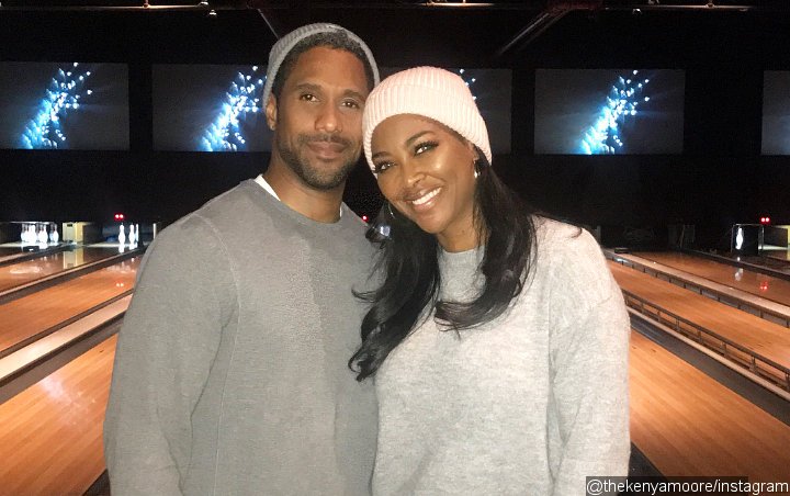 Report: 'RHOA' Star Kenya Moore 'Contemplating Reconciling' With Husband Marc Daly