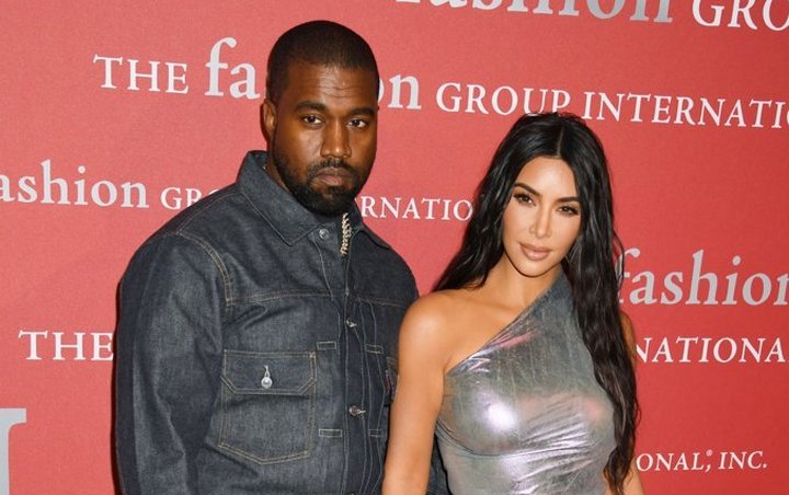 Kanye West Pays Kim Kardashian $1M and Makes Her Yeezy Owner for Not Modeling for Rival Brand