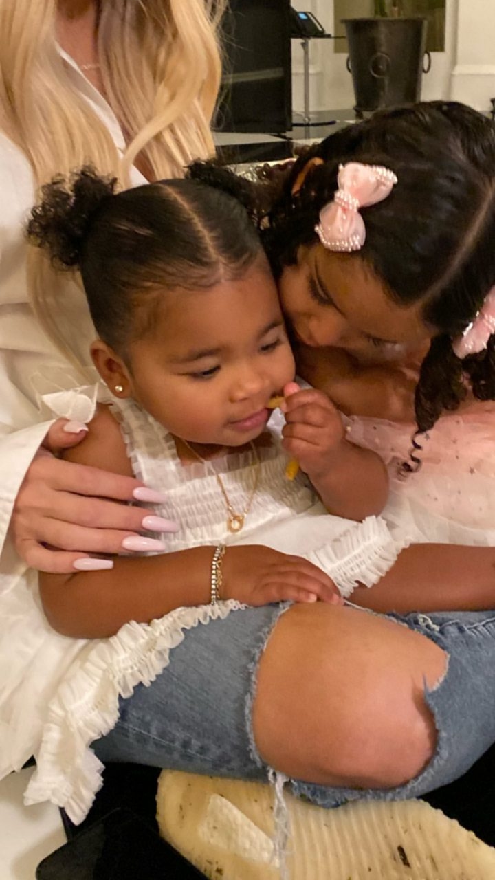Baby Dream plays with True Thompson