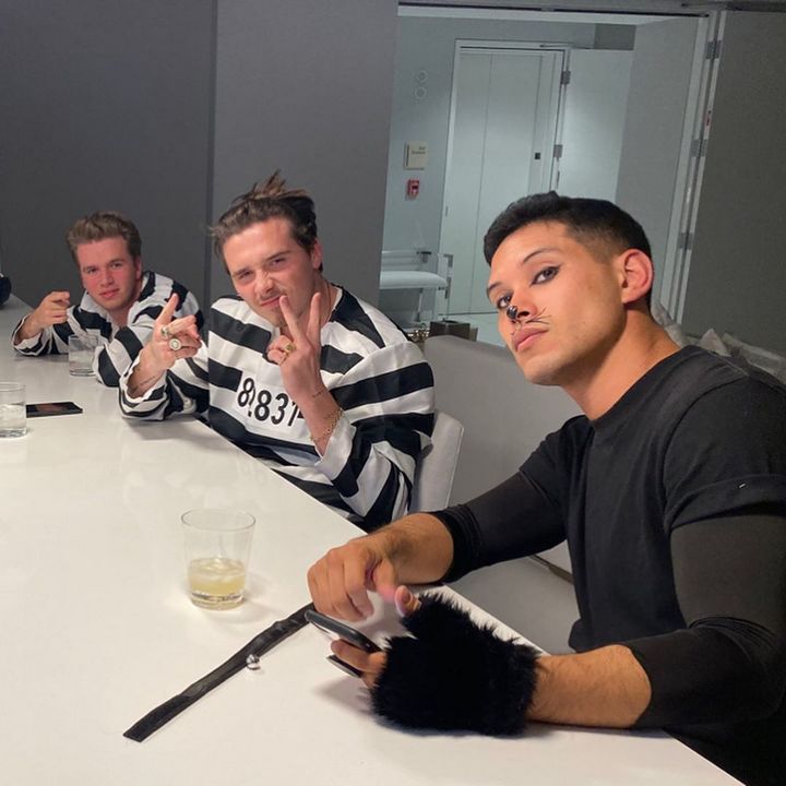 Brooklyn Beckham wears prison jumpsuit for Halloween party