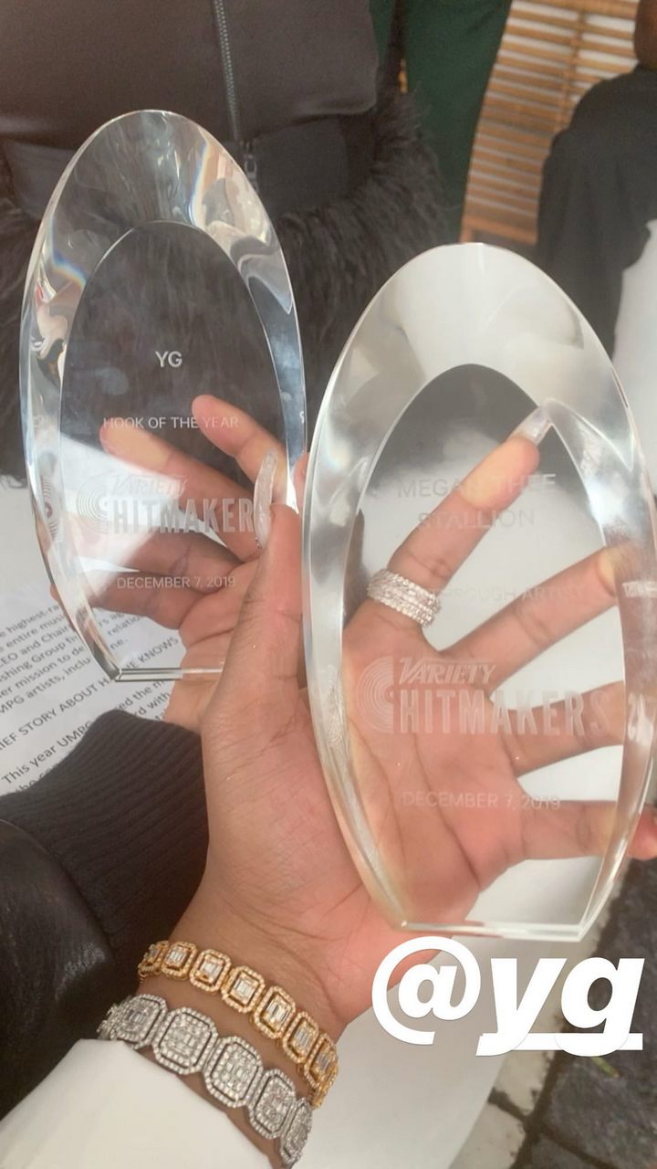 Megan Thee Stallion and YG show off their trophies