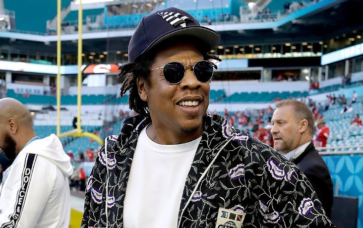 Jay-Z Responds to Backlash for Sitting Down During National Anthem: It's Not a Protest