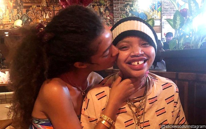 Model Slick Woods Debuts New Girlfriend With PDA-Filled Photos