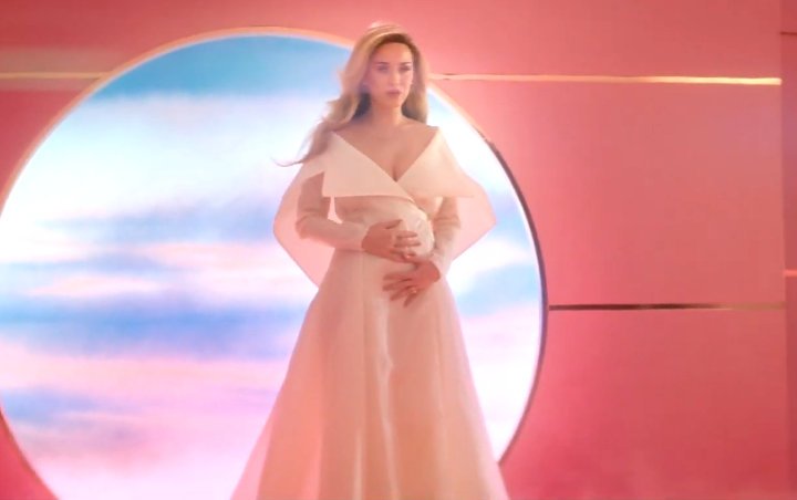Katy Perry Unveils First Pregnancy Through 'Never Worn White' Music Video