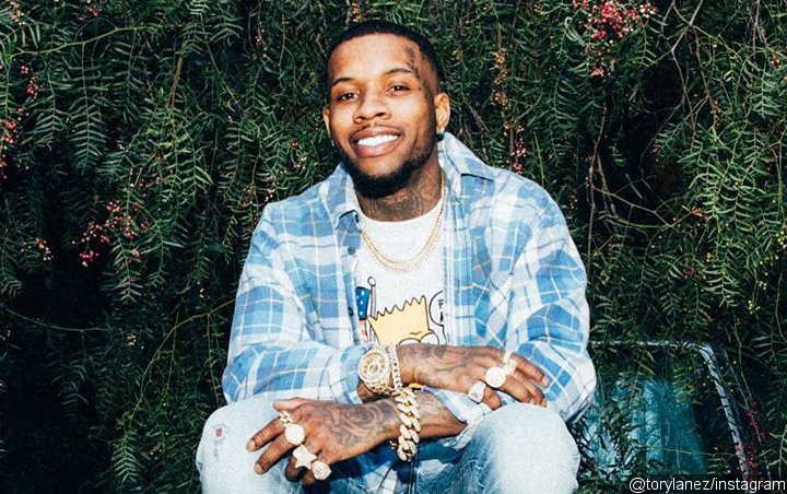 Watch: Tory Lanez Accused of Fleeing After Punching a Man