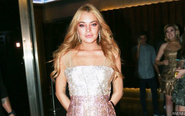 Lindsay Lohan Tips Off Upcoming Release of New Single After 'Xanax'