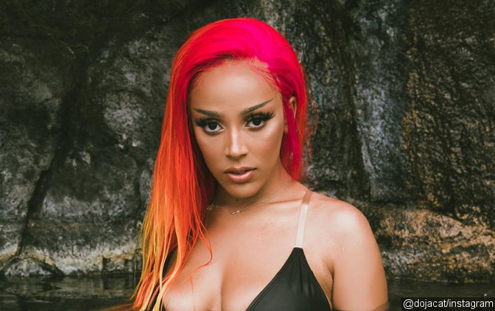 Doja Cat Tempts Fans With Hardcore Look at Her Breasts to Boost 'Say So (Remix)' Streams