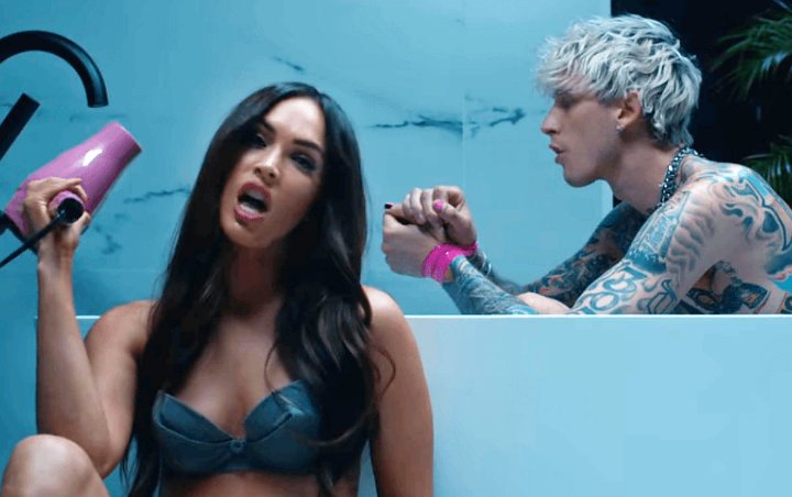Machine Gun Kelly Offers Footage of Megan Fox in a Towel From Music Video's Behind-the-Scenes