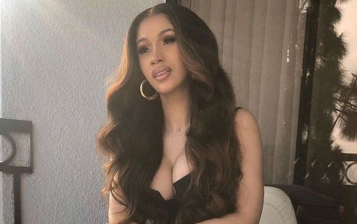 Cardi B Goes Through 'Hours of Pain' to Give Huge Peacock Tattoo a Makeover