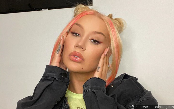 Iggy Azalea Claps Back at Troll Ridiculing Her Baby's Name