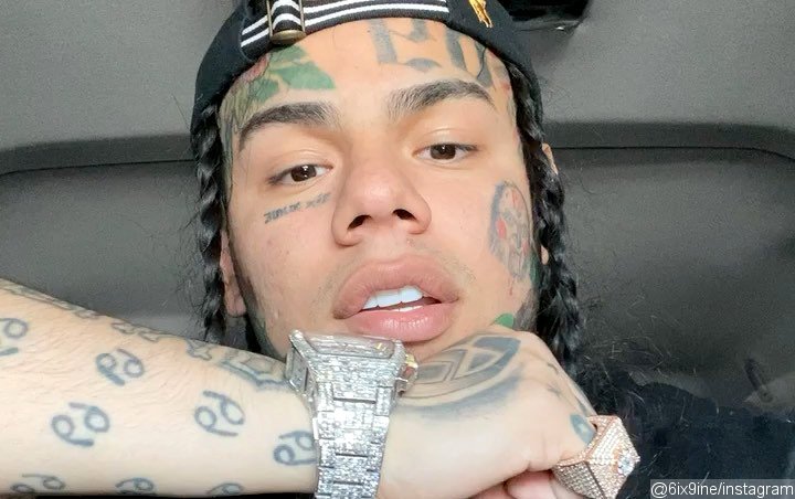 6ix9ine Insists 'TattleTales' Doesn't Flop After Forcing Strangers to Take His Album
