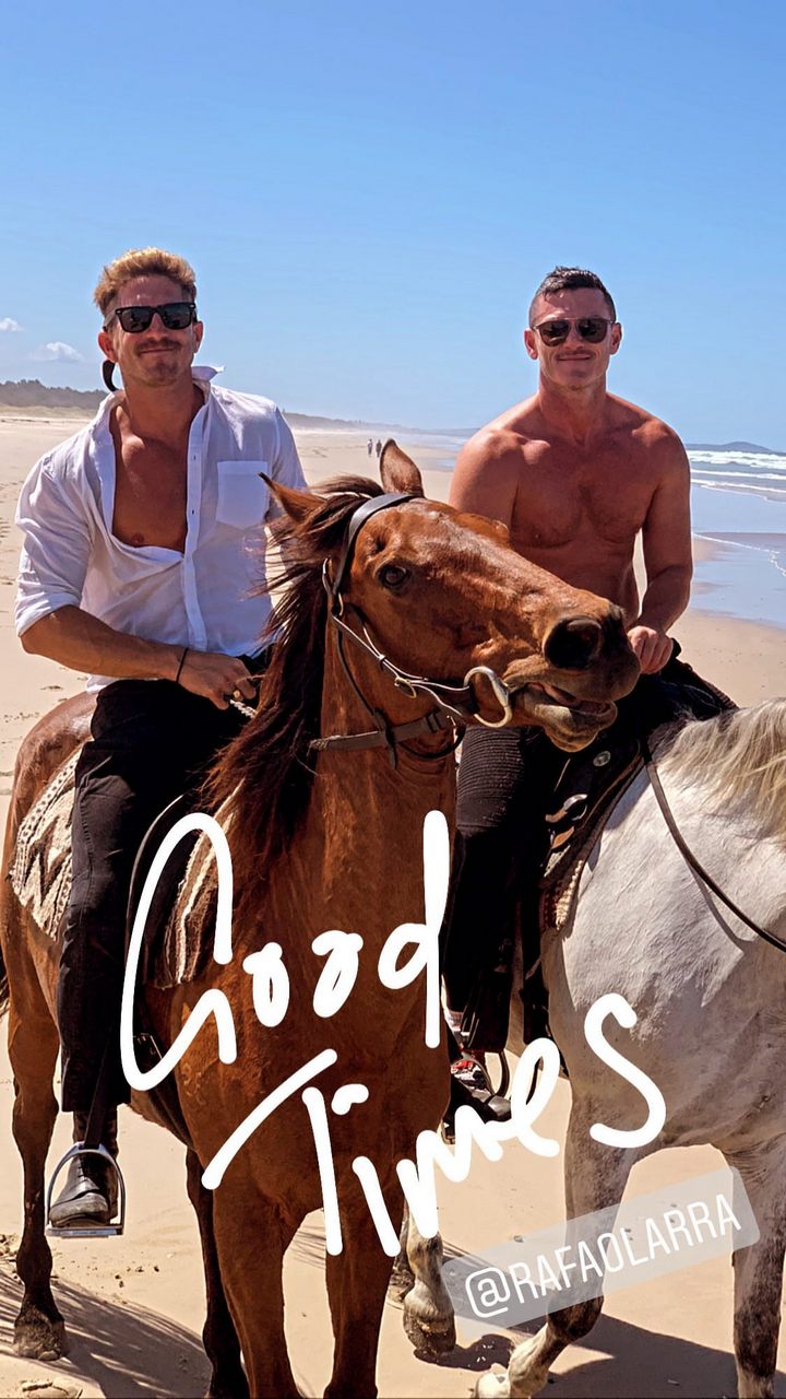 Luke Evans enjoys a beach day with boyfriend